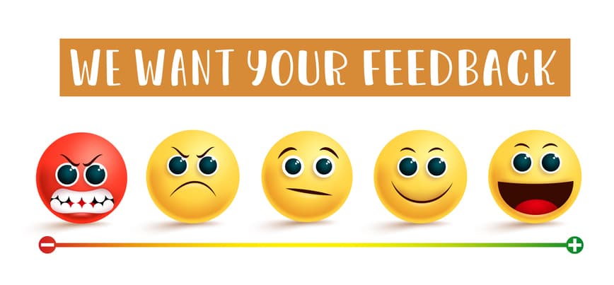 A scale of emojis from angry to delighted lined up under a header that says, “we want your feedback.”
