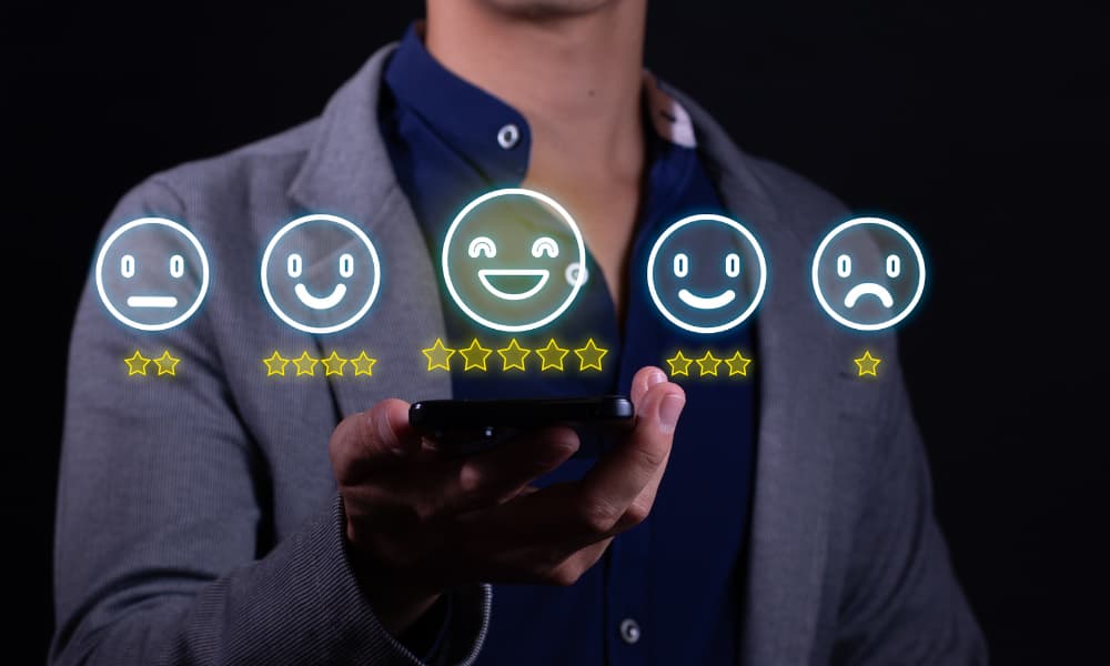 A crew member checking star ratings because gamification has improved their employee engagement, which is helping their team combat negative online reviews