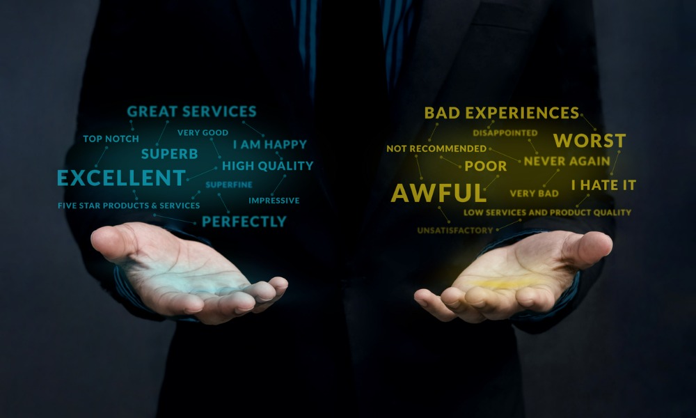 A pair of hands balancing negative and positive customer reviews. 