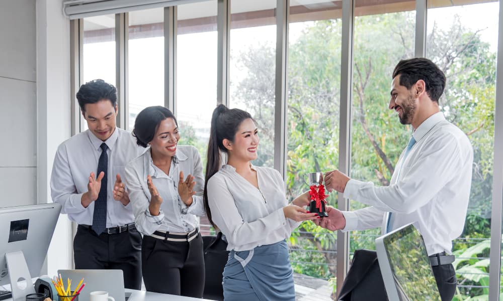 The boss presented an award to outstanding employees